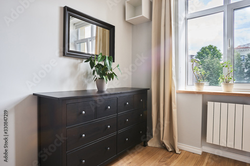 Canvas Print flower on the dresser by the mirror in the bedroom