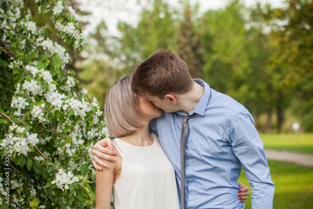 Kiss. Young couple kissing and hugging Kiss. Young couple kissing and hugging