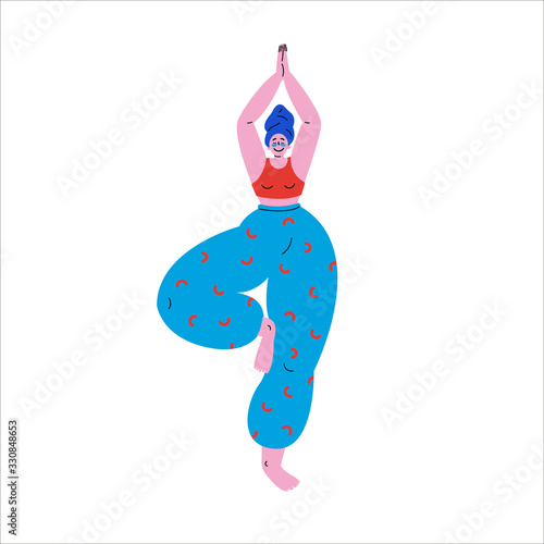 Happy plus size girl standing in tree pose yoga position.Beauty concept.Beautiful woman after a bath with a towel on the head puts patches under the eyes and does the morning ritual practices yoga