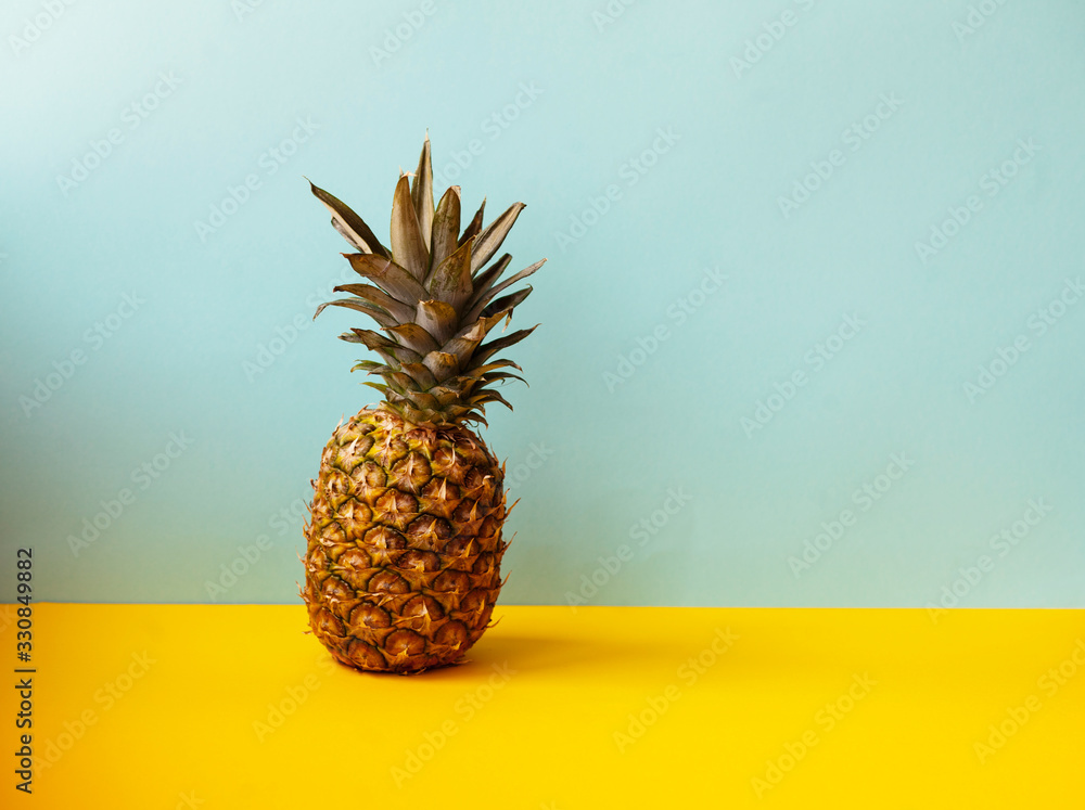 pineapple on a yellow and blue background pineapple on a yellow and blue background