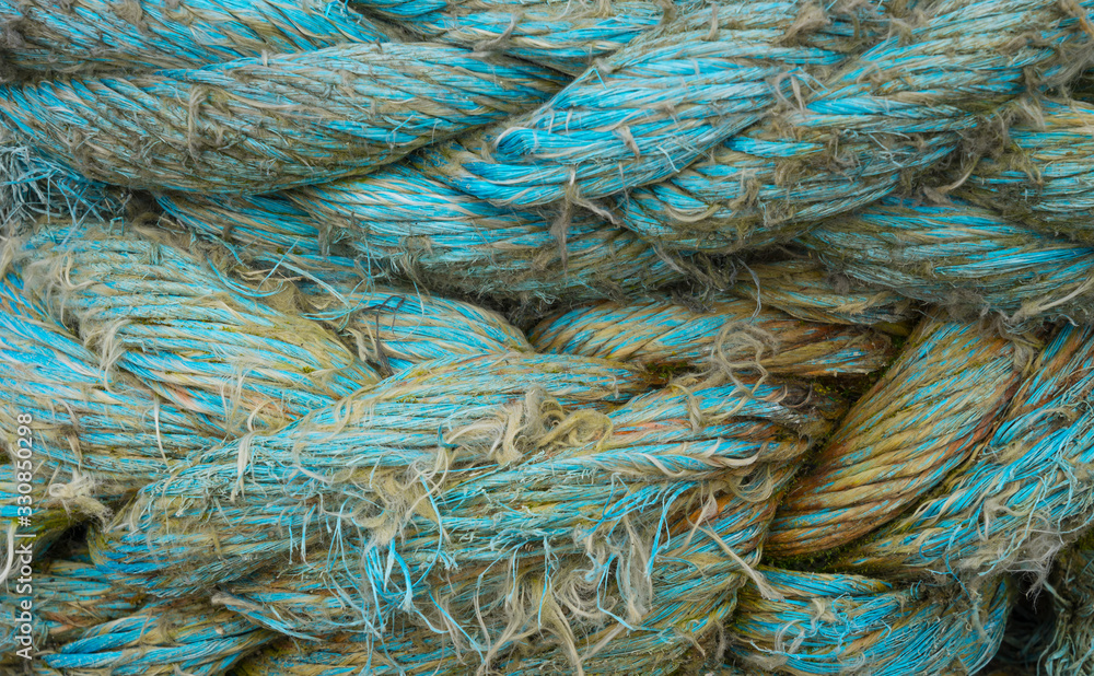 Close up of worn mooring ropes. Close up of worn mooring ropes.