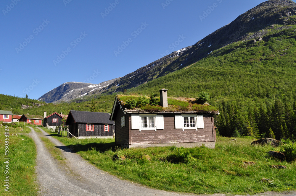 Old wooden houses in nature in the mountains - Norway