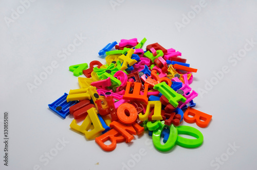 multi-colored letters of the Russian alphabet on a white background. letters are randomly stacked