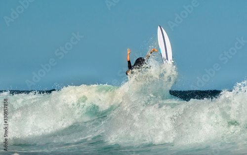 Surfer riding a large wave, SydneyAustralia