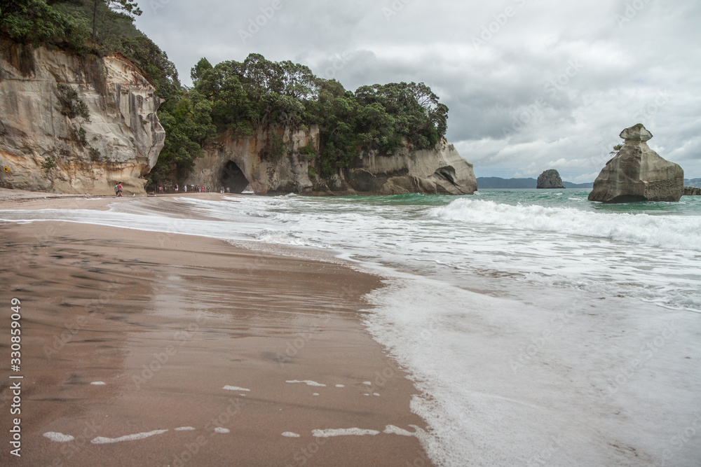 Scenic view of Cathedral Cove, New Zealand Scenic view of Cathedral Cove, New Zealand