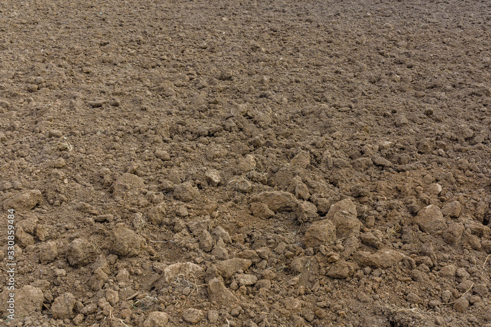 Background of the plowed field prepared for sowing Background of the plowed field prepared for sowing