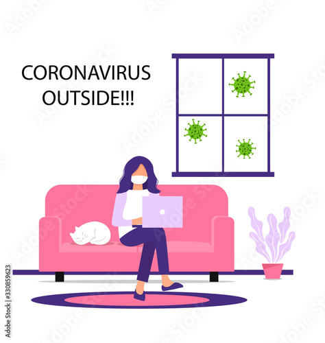 Work from home during an outbreak of the COVID-19 virus. People work at home to prevent virus infection. Woman working on the couch with a cat. Girl in a mask works on a laptop at home.