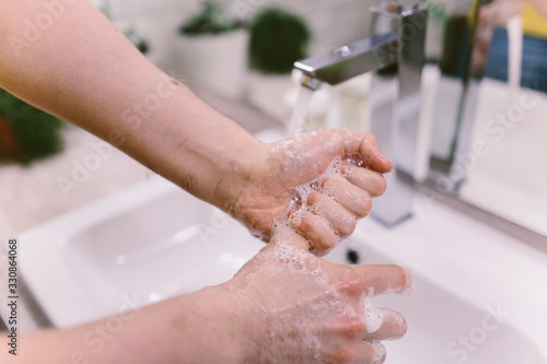 Corona virus hands hygiene coronavirus spreading pandemic prevention header. China outbreak doctor wearing face mask versus man washing hands rubbing soap using hand sanitizer gel