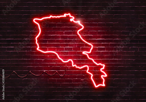 Neon sign on a brick wall in the shape of Armenia.(illustration series)