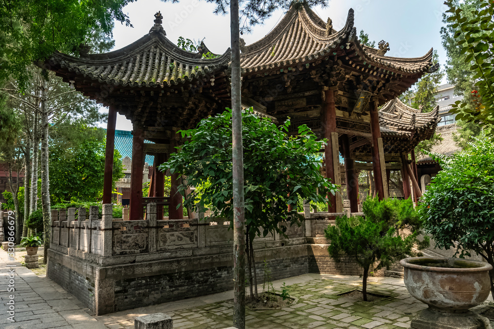 Three small pagodas at center main courtyard gardens. Great Mosque of Xi'an at Xi'an old city, Shaanxi Province, China