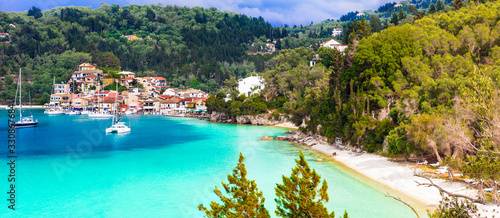 Greece, Ionian islands. Picturesque fishing village Lakka in Paxos with turquoise sea