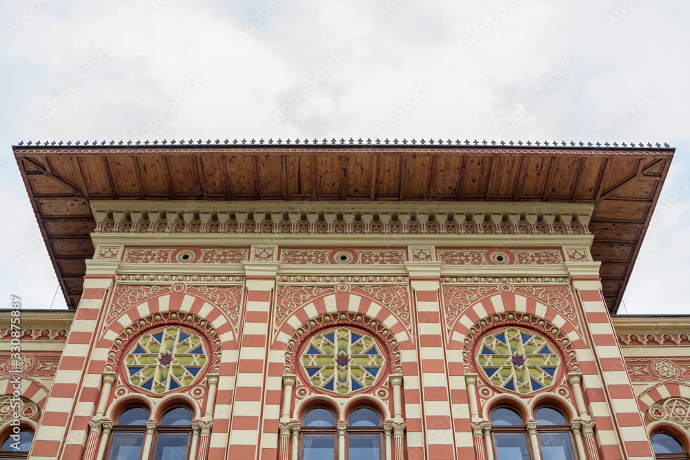 Obraz premium Facade of the main hall of the Vijecnica, the former library and city hall of Brcko, bosnia and Herzegovina, built in the 19th century, characterized by its ottoman style