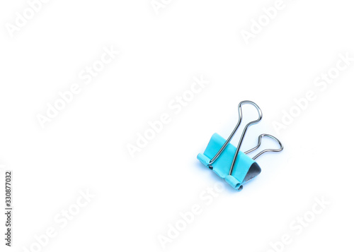 Colorful binder clip isolated on white background