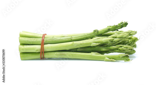 Fresh green asparagus on white