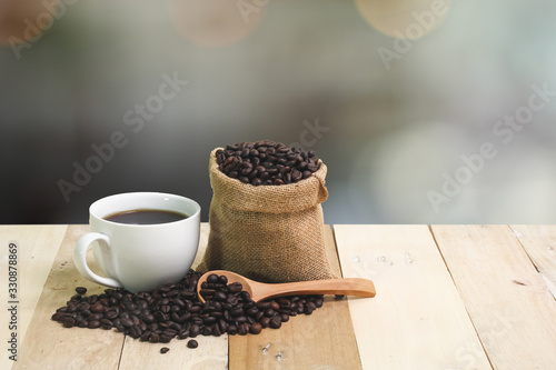 Hot Coffee cup on the wooden table