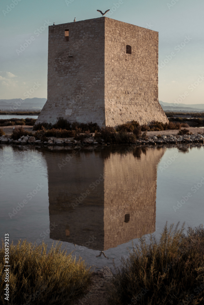 Small tower in the sunrise