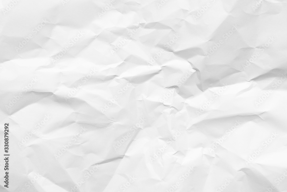 White crumpled paper texture background. Clean white paper. Top view. White crumpled paper texture background. Clean white paper. Top view.