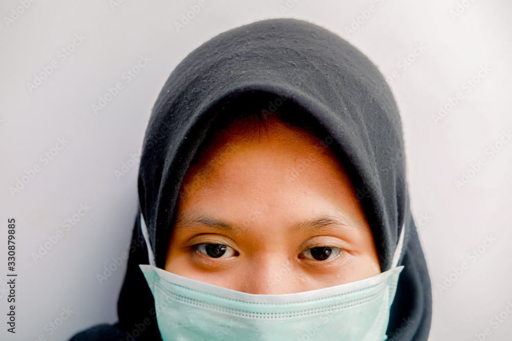 Close-up of young Asian, wearing masks. Corona Protection