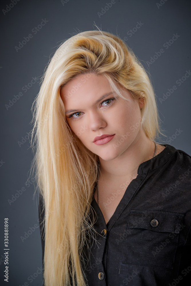 Naklejka premium Blond Girl wearing Black Clothing