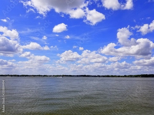 The view of the beautiful blue sky by the lake near Heritage Park, Winter Haven, Florida, U.S.A