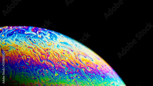 Soap bubbles, similar to planets, close-up