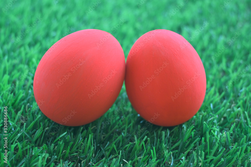red easter egg on lawn green grass artificial, image of morning springtime concept red easter egg on lawn green grass artificial, image of morning springtime concept