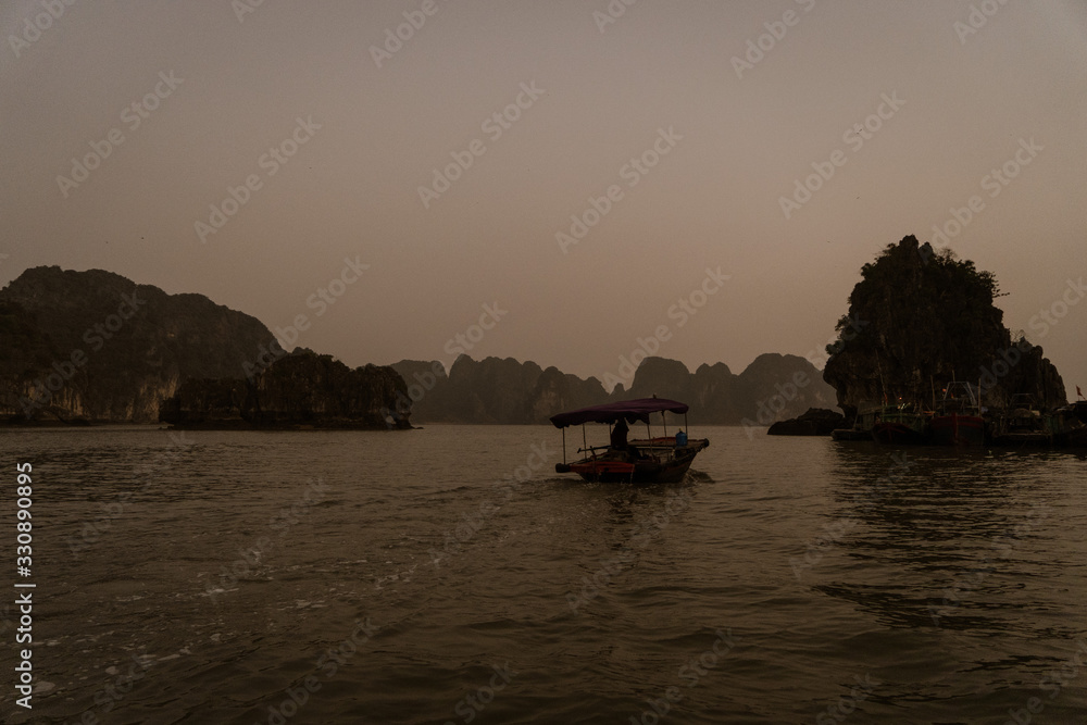 fishing boat at sunset