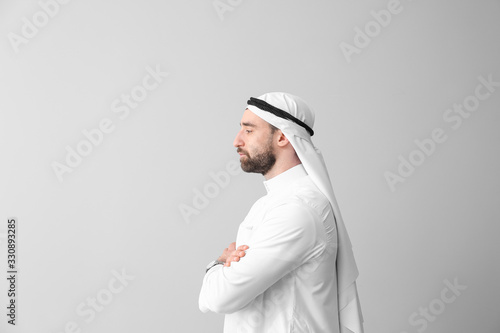 Photography Handsome Arab man on grey background