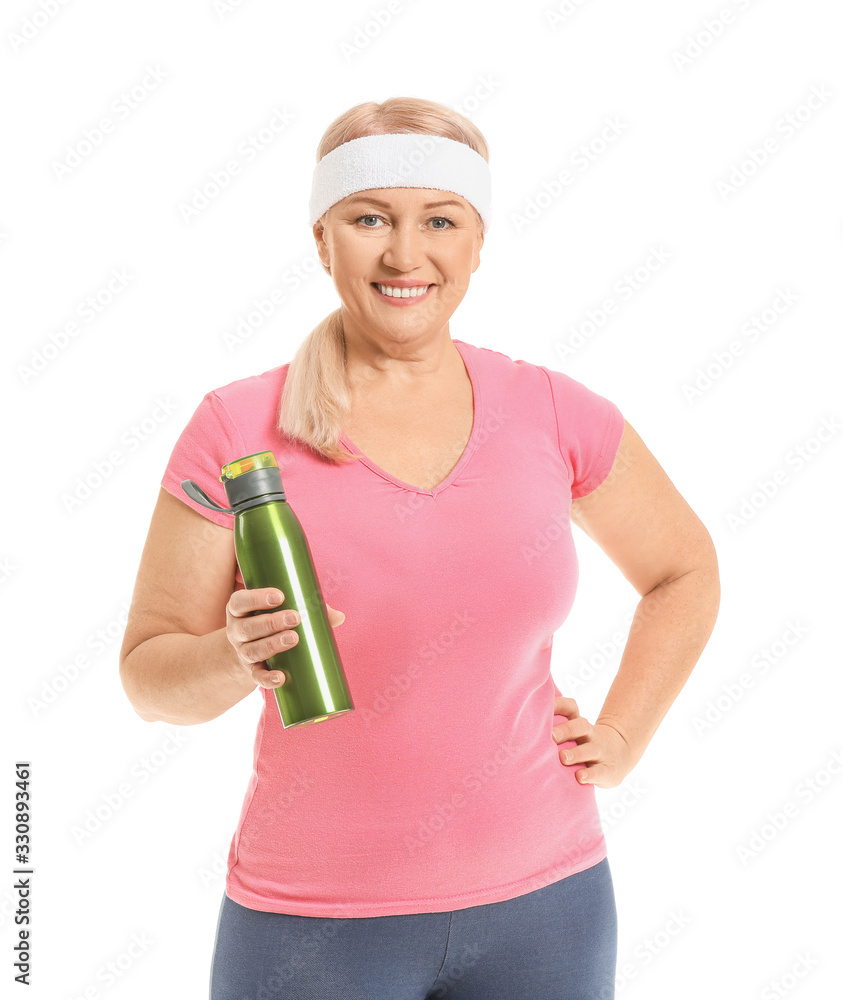 Sporty mature woman with bottle of water on white background Sporty mature woman with bottle of water on white background
