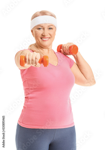 Sporty mature woman trainin...