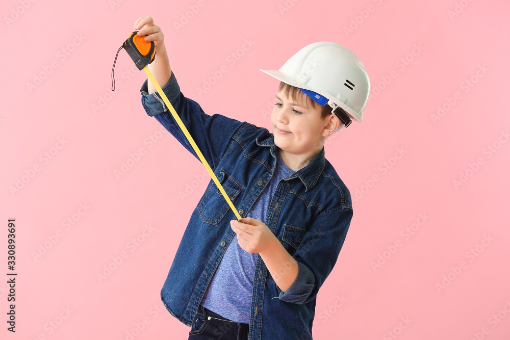 Cute little builder on color background Cute little builder on color background