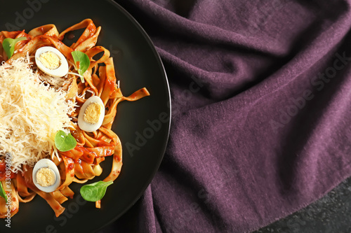 Plate with tasty pasta and ...