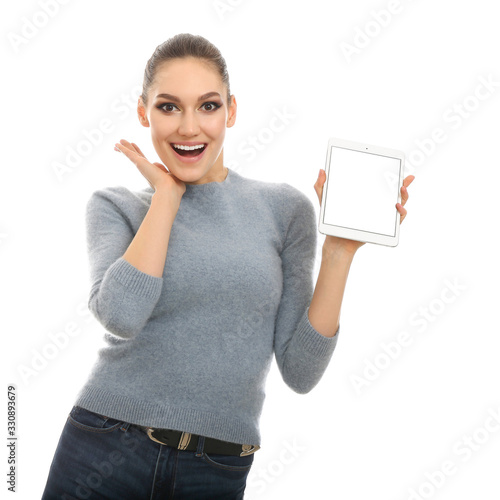 Happy young woman with tabl...