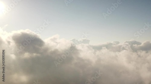 Wallpaper Mural Sunrise above a blanket of dancing clouds high in the mountains of India. The shot starts zoomed in at the sun and slowly zooms out to reveal a wider scene. Torontodigital.ca