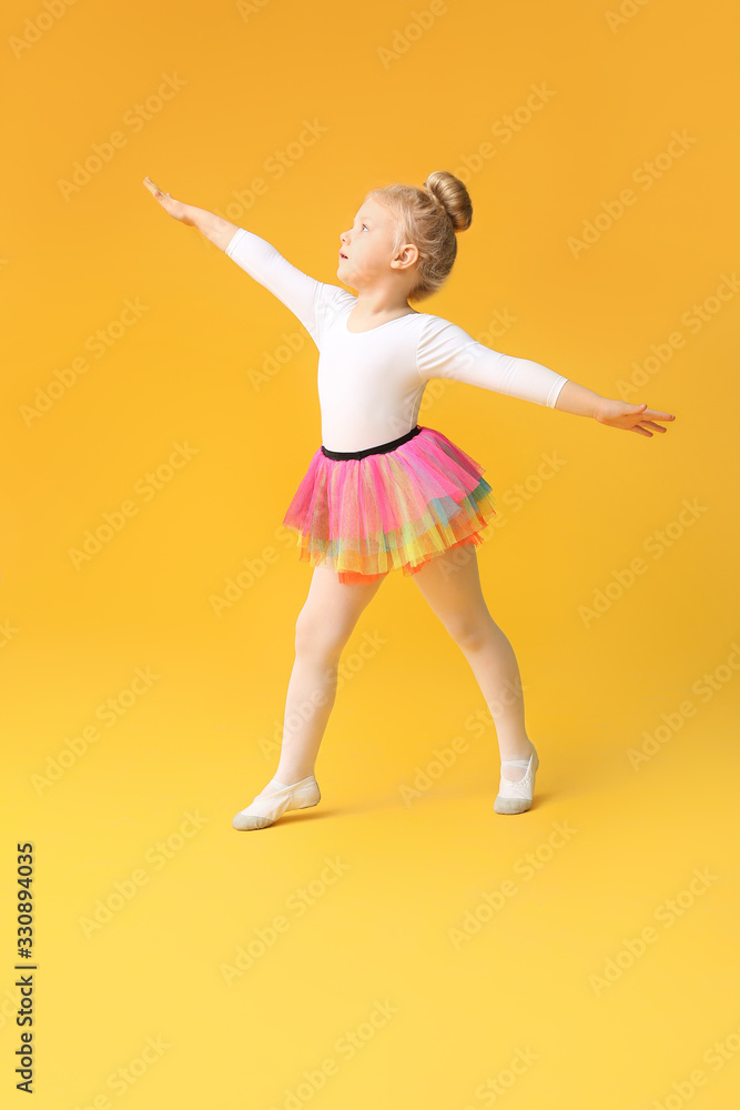 Cute little ballerina on color background Cute little ballerina on color background