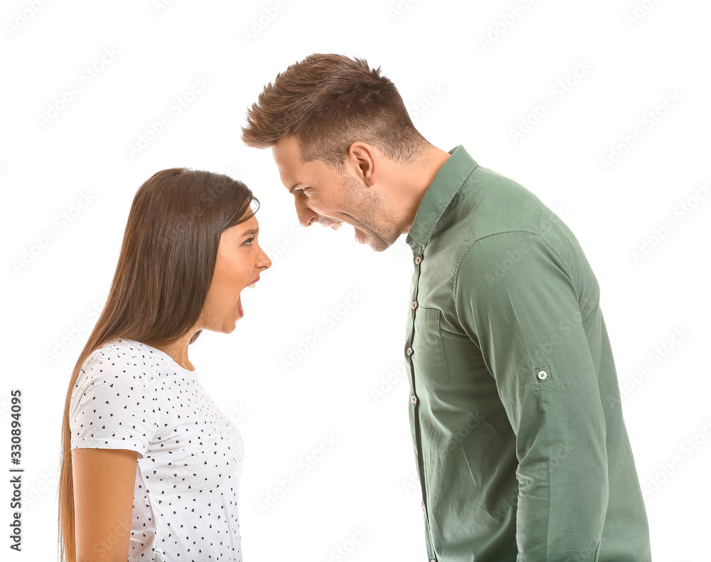 Young couple quarreling on white background Young couple quarreling on white background