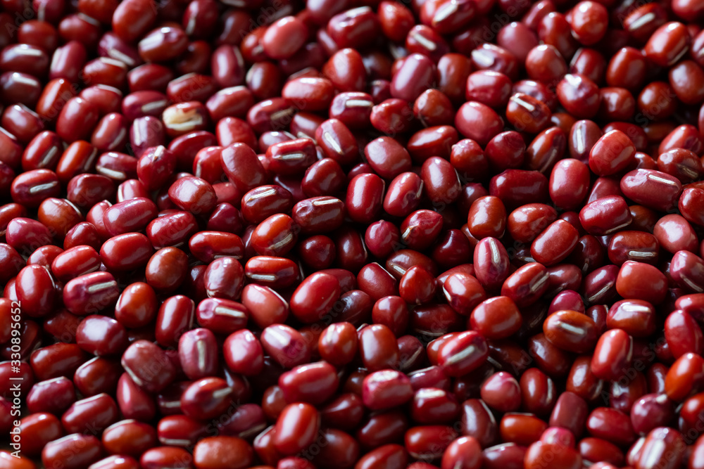 Red adzuki beans background from directly above. Organic,healthy food concept. Red adzuki beans background from directly above. Organic,healthy food concept.