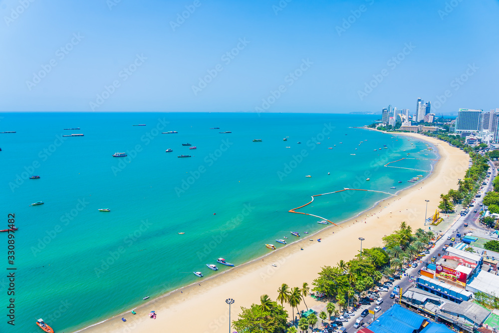 Beautiful tropical beach sea ocean bay and architecture building in Pattaya city Thailand