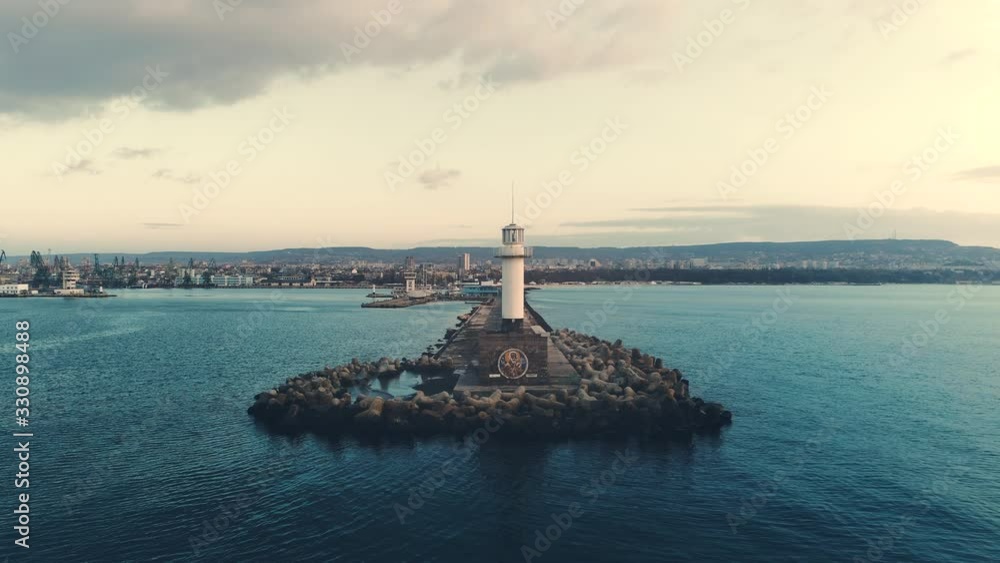 Lighthouse and the sea port at sunset, Aerial view of Varna, Bulgaria Lighthouse and the sea port at sunset, Aerial view of Varna, Bulgaria
