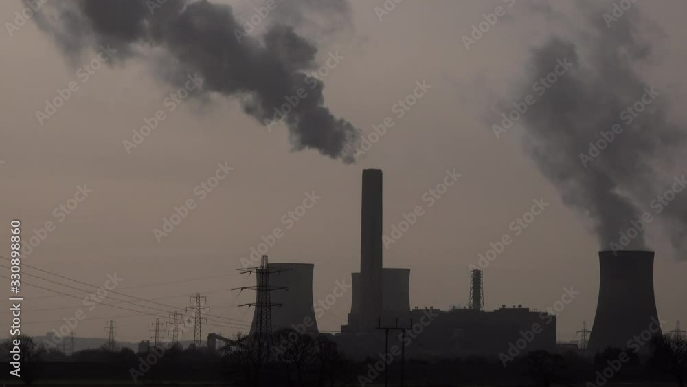 Industrial landscape in the north of England with chimneys and turbines UK 4K Industrial landscape in the north of England with chimneys and turbines UK 4K