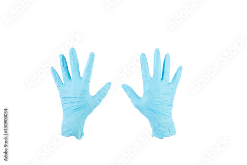 Blue rubber gloves in white background 