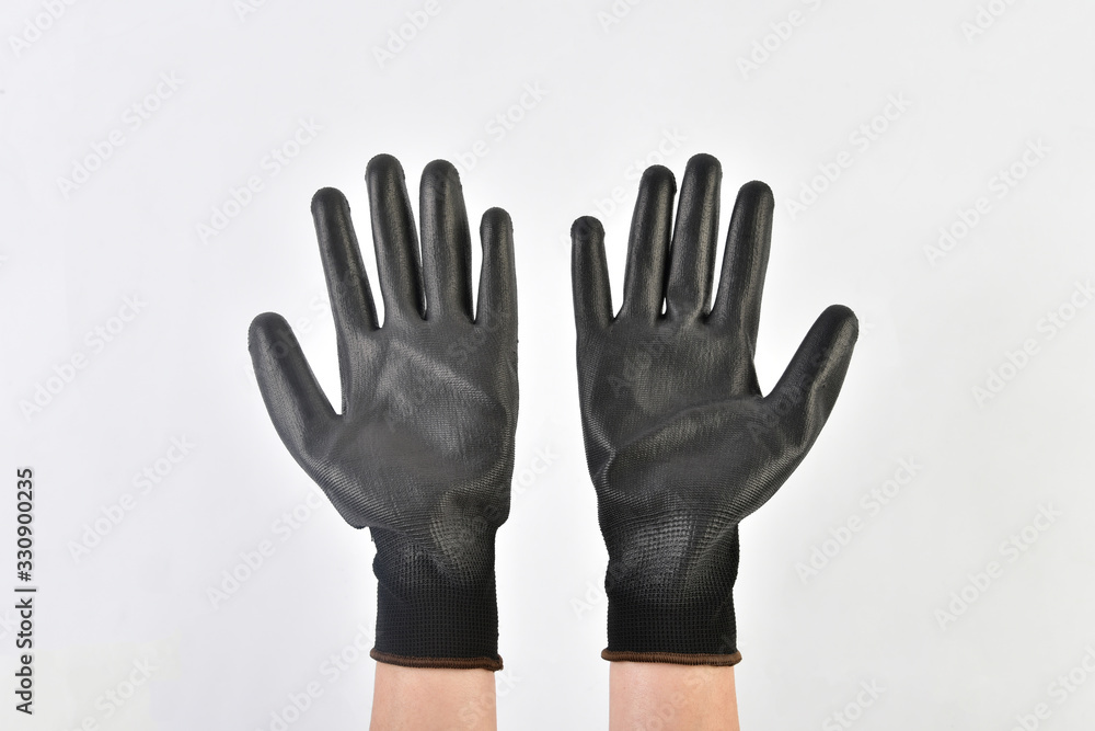 Obraz premium black gloves isolated on a white background