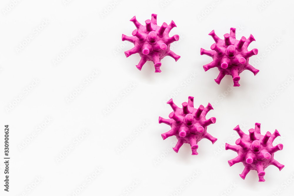 Abstract Corona virus Covid-19 strain model on white background top-down pattern copy space Abstract Corona virus Covid-19 strain model on white background top-down pattern copy space