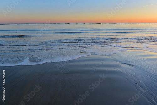 scenic view on the sea and the sun at sunset