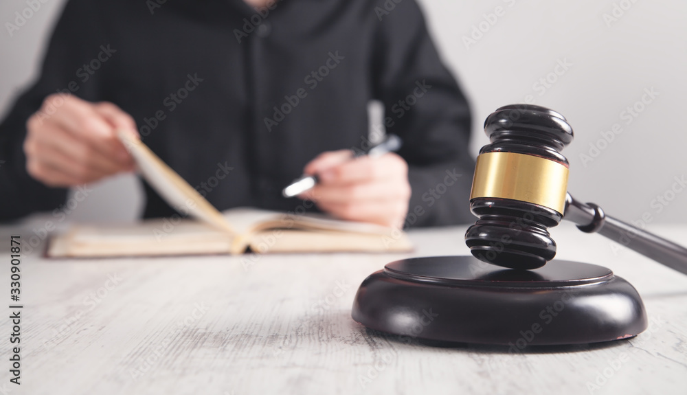 Gavel on sounding block. Judge working. Justice and Law Gavel on sounding block. Judge working. Justice and Law