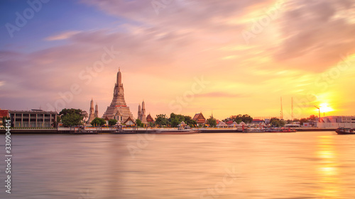 Wat Arun Ratchawararam Ratchawaramahawihan at sunset in bangkok Thailand. Landmark of Thailand
