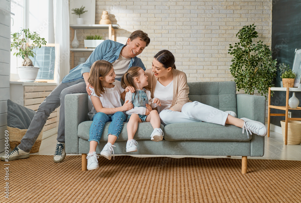 Two children with mother and father. Two children with mother and father.