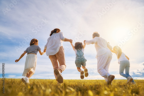 Happy family on summer walk