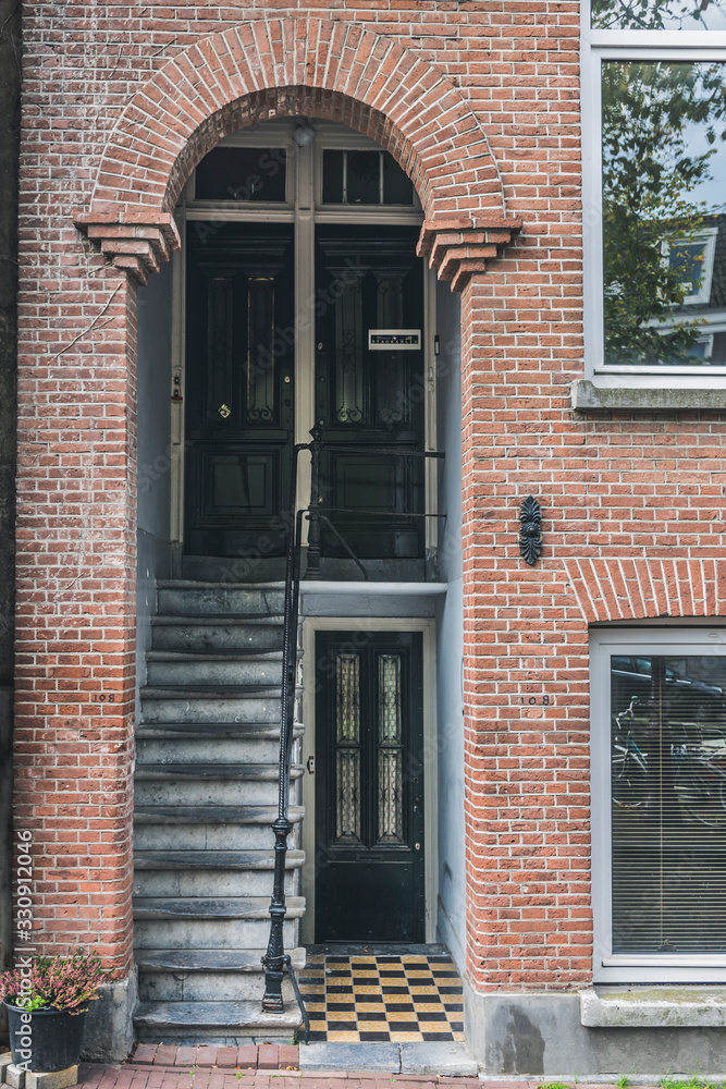 pipica amsterdam house entrance, portal. vertical photography