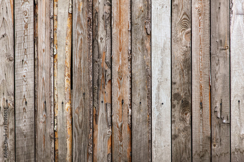 Old wooden boards on the fence